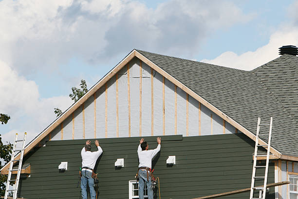 Professional Siding Installation technician working in Aurora, CO